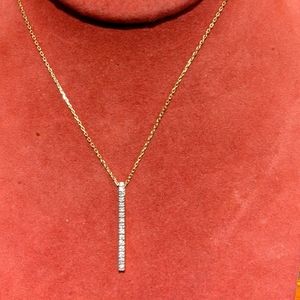 10K Yellow Gold and Diamond Bar Pendant.